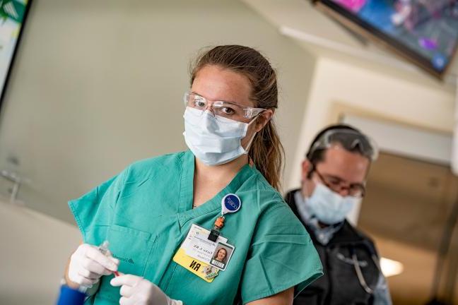 Nurses wearing surgical masks at DHMC and Dartmouth Hitchcock Clinics