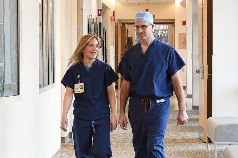 Dartmouth Health caregivers walking in a hallway
